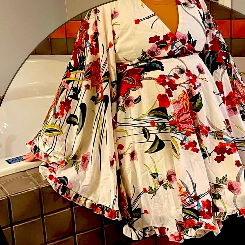 A dress from Melanie Lyn worth 150